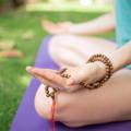 meditating with mala beads 