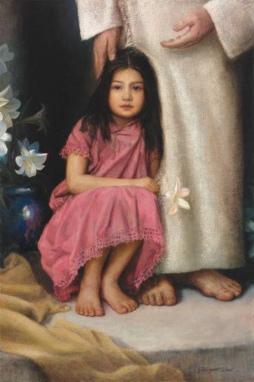 A little girl holding a flower and sittting at Jesus' feet. 