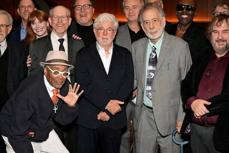Image may contain: Francis Ford Coppola, George Lucas, Jon Favreau, Christopher Nolan, Spike Lee, Ron Howard, and Blazer