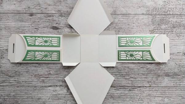a box with green designs on it