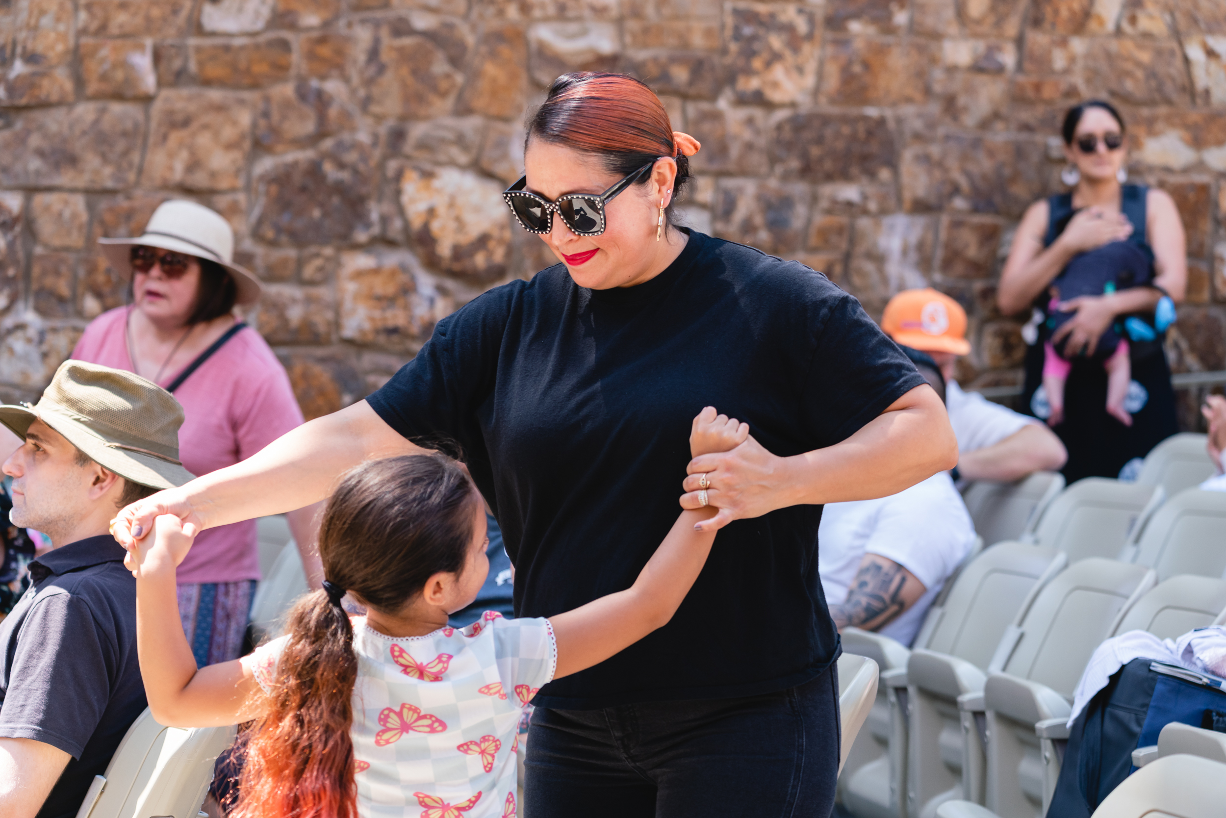 Mother and daughter dancing at an LA Soundscapes family concert