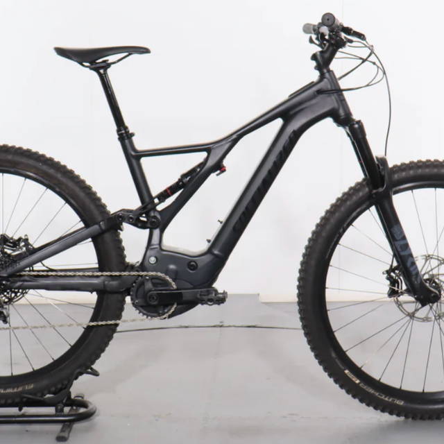 a black Specialized Turbo Levo full suspension electric mountain bike