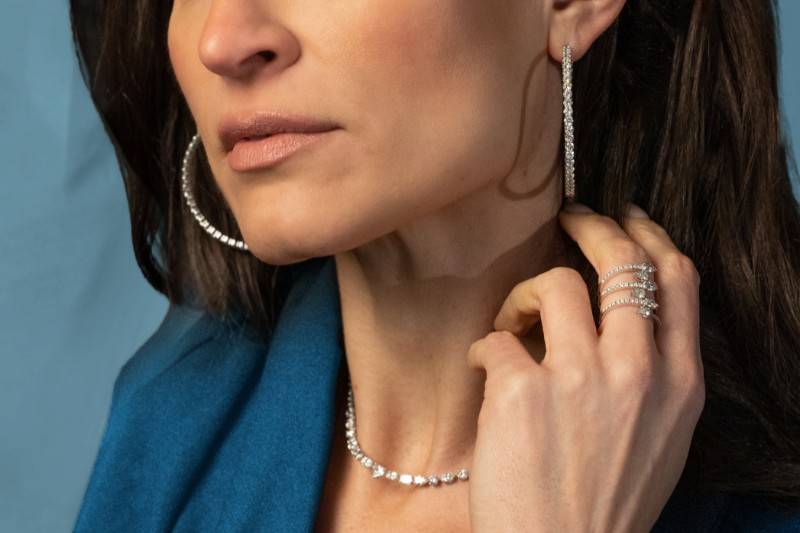 Woman modeling diamond jewelry - discover diamond jewelry