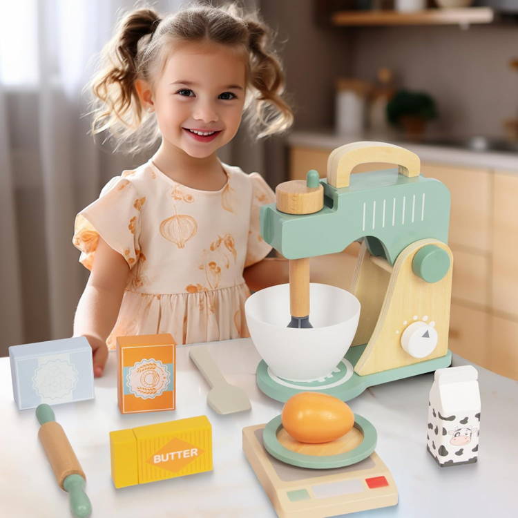 Little girl posing next to her Montessori Mixer Set.