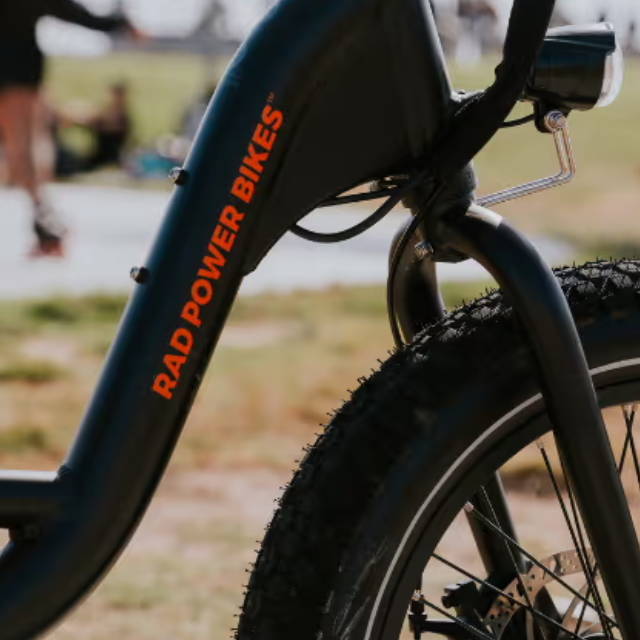 a rad power fat tire electric bike at the beach