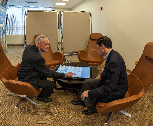 And props up your coffee, too: The tablet bot is a mobile telepresence device on a conference table or desk top.