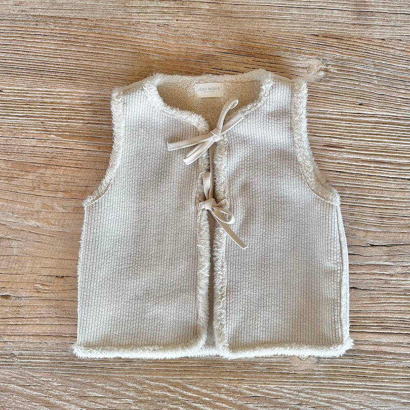 le gilet réversible beige bleu fabriqué au portugal junior adulte matchy matchy famille suisse excellence qualité élégance cadeau indispensable must-have style qualité excellence premium marque swiss brand 