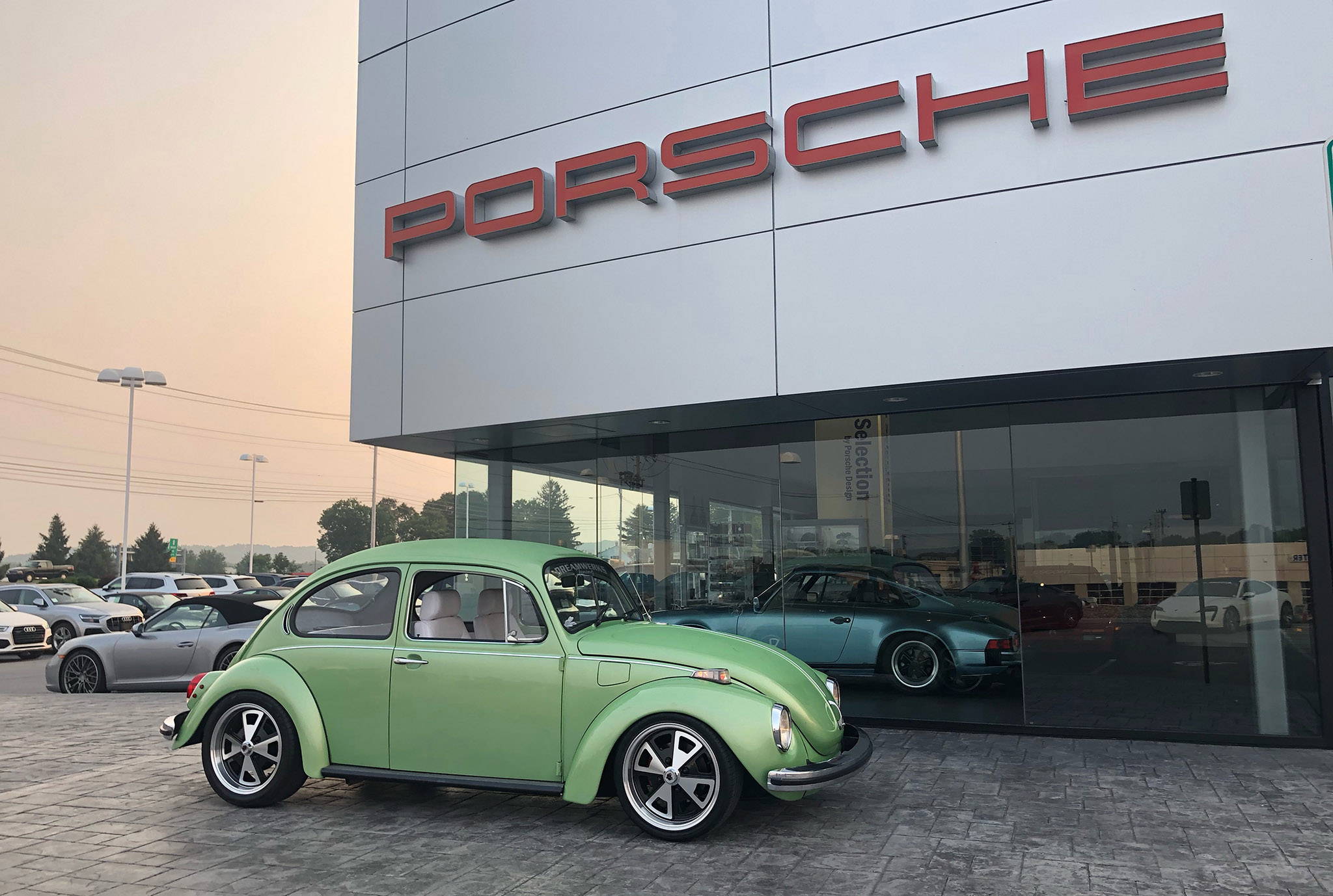 green volkswagen beetle on black machined klassik rader 914 wheels